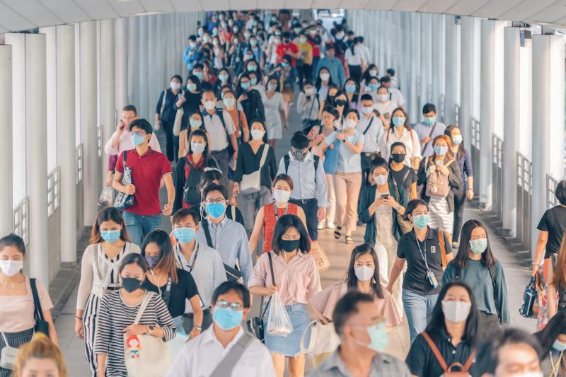 Crowd of people wearing masks